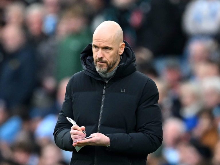 Erik ten Hag taking notes