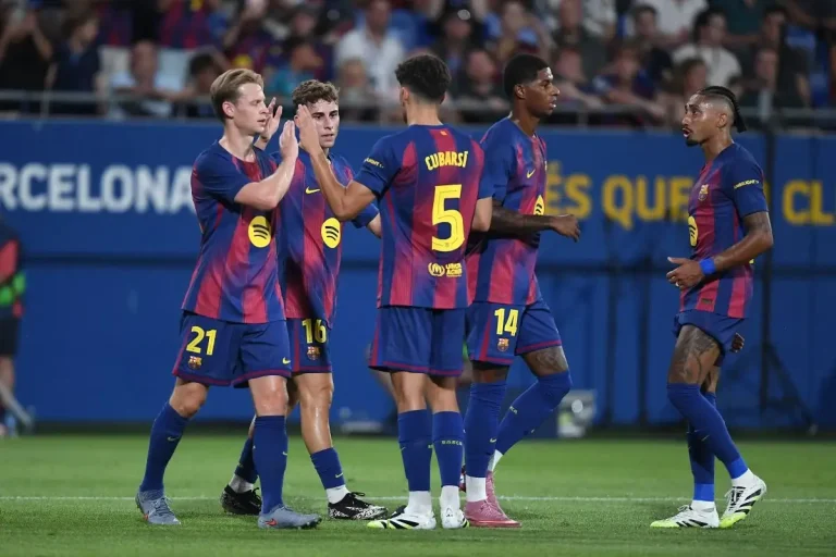 Barcelona quad celebrating including Frenkie de Jong, Fermin Lopez, Marcus Rashford