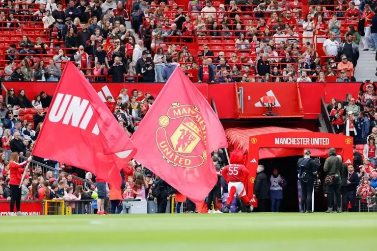 Manchester United flag and tunnel at Old Trafford