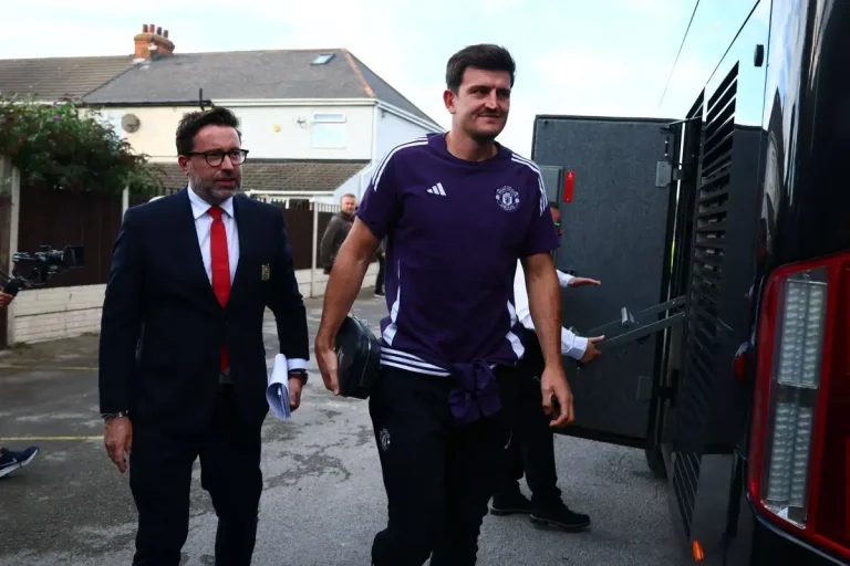 Harry Maguire getting off of team bus